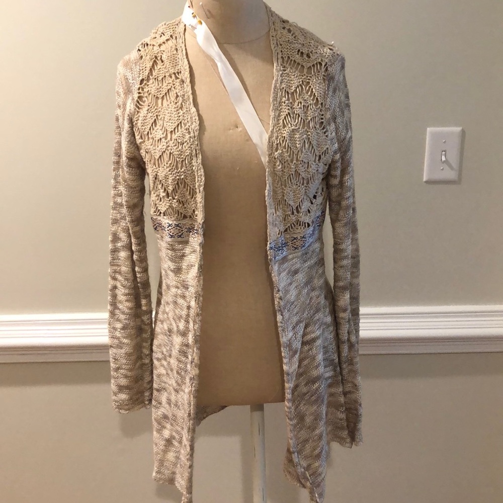 tan sweater